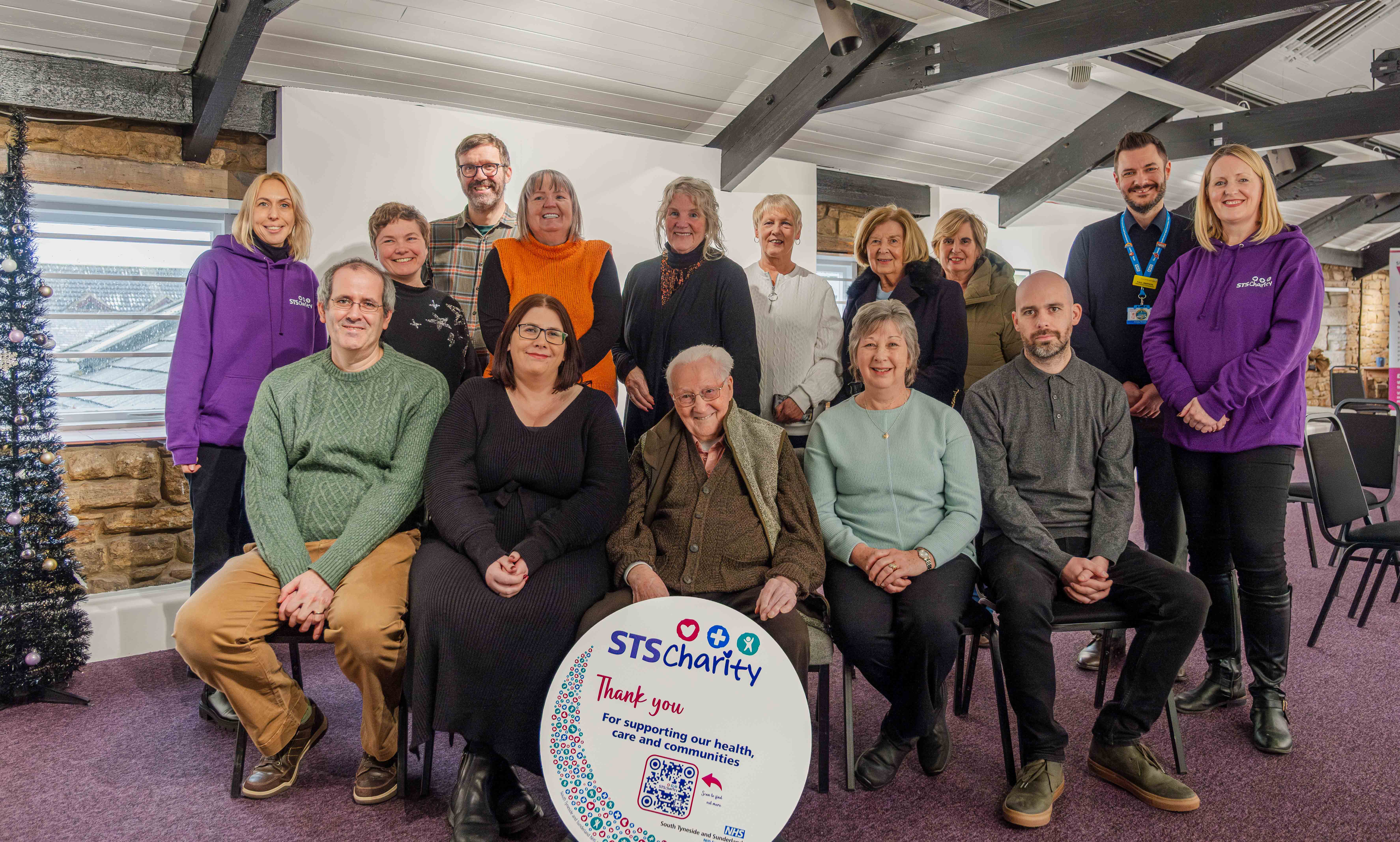 David Hughes MBE at the preview surrounded by his family, members of his art club and reps from STS Charity, SEI and Sunderland Culture.jpg