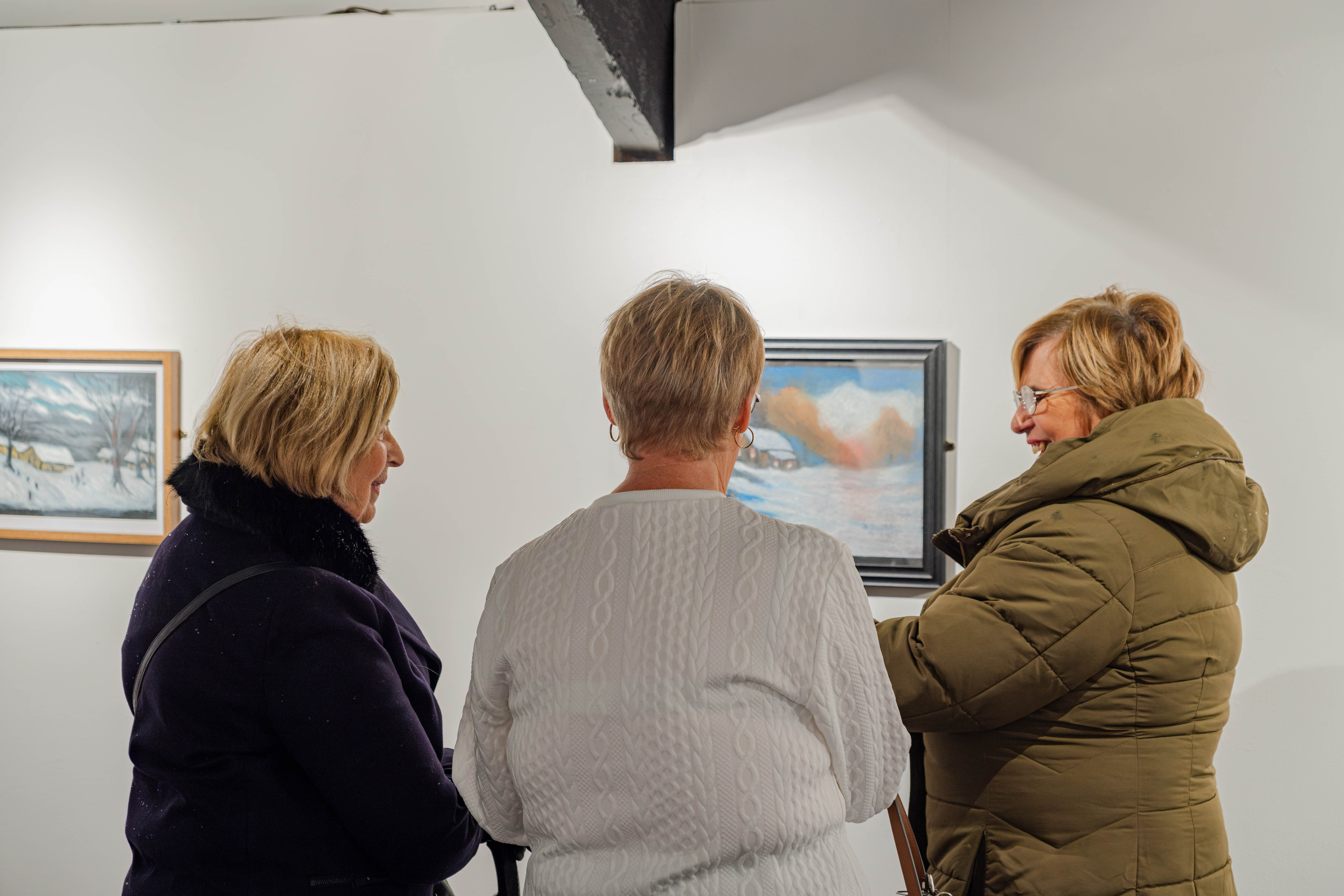 Members of David's art club enjoying the preview.jpg