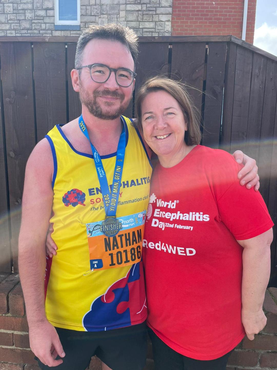 Nathan Taylor and his mother-in-law Evie Laycock, pictured after he completed last year's Great North Run for the Encephalitis Society..jpg