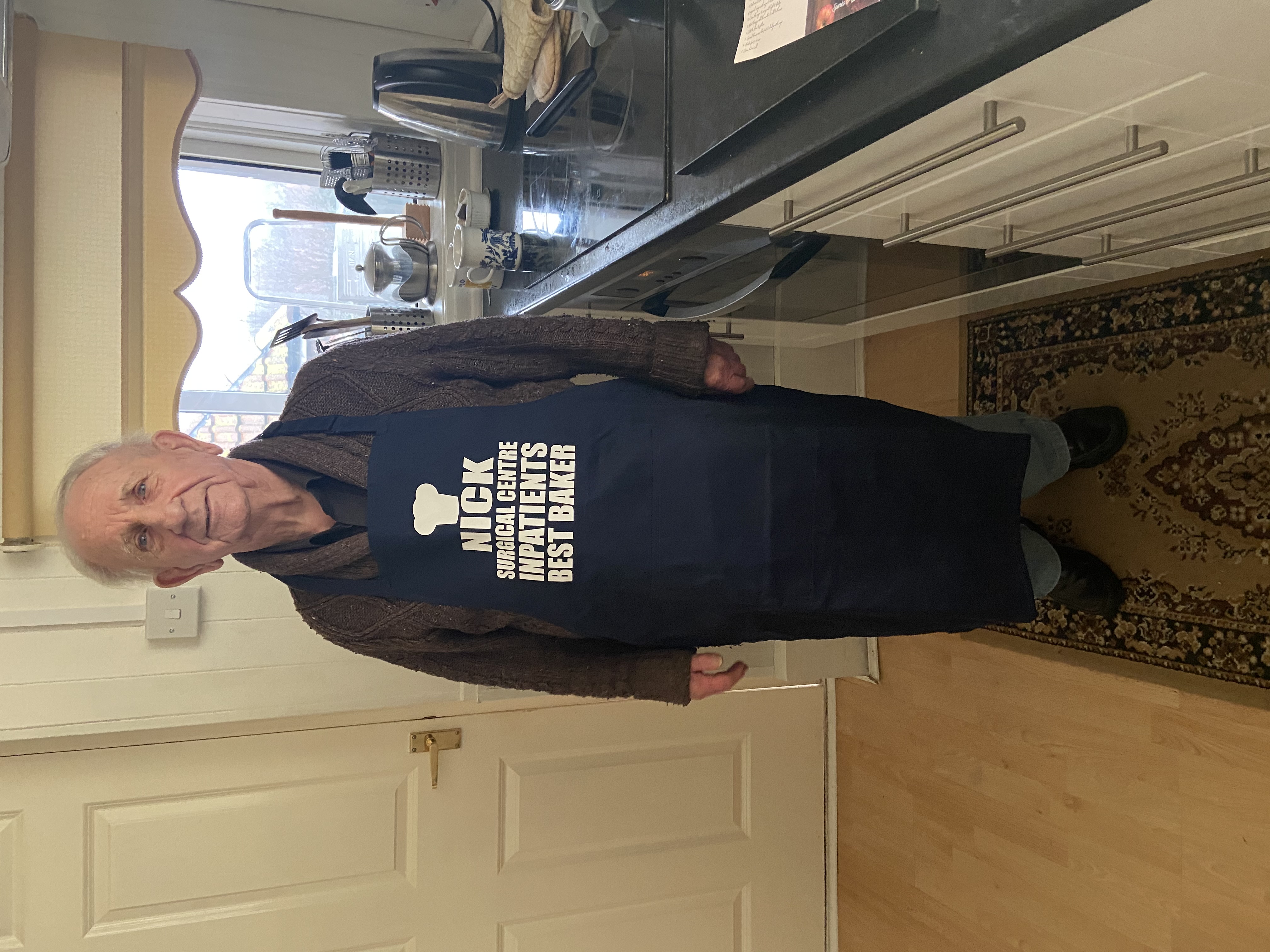 Nick Cunningham wearing the apron his friends at South Tyneside District Hospital's SCIP ward gifted to him..jpg