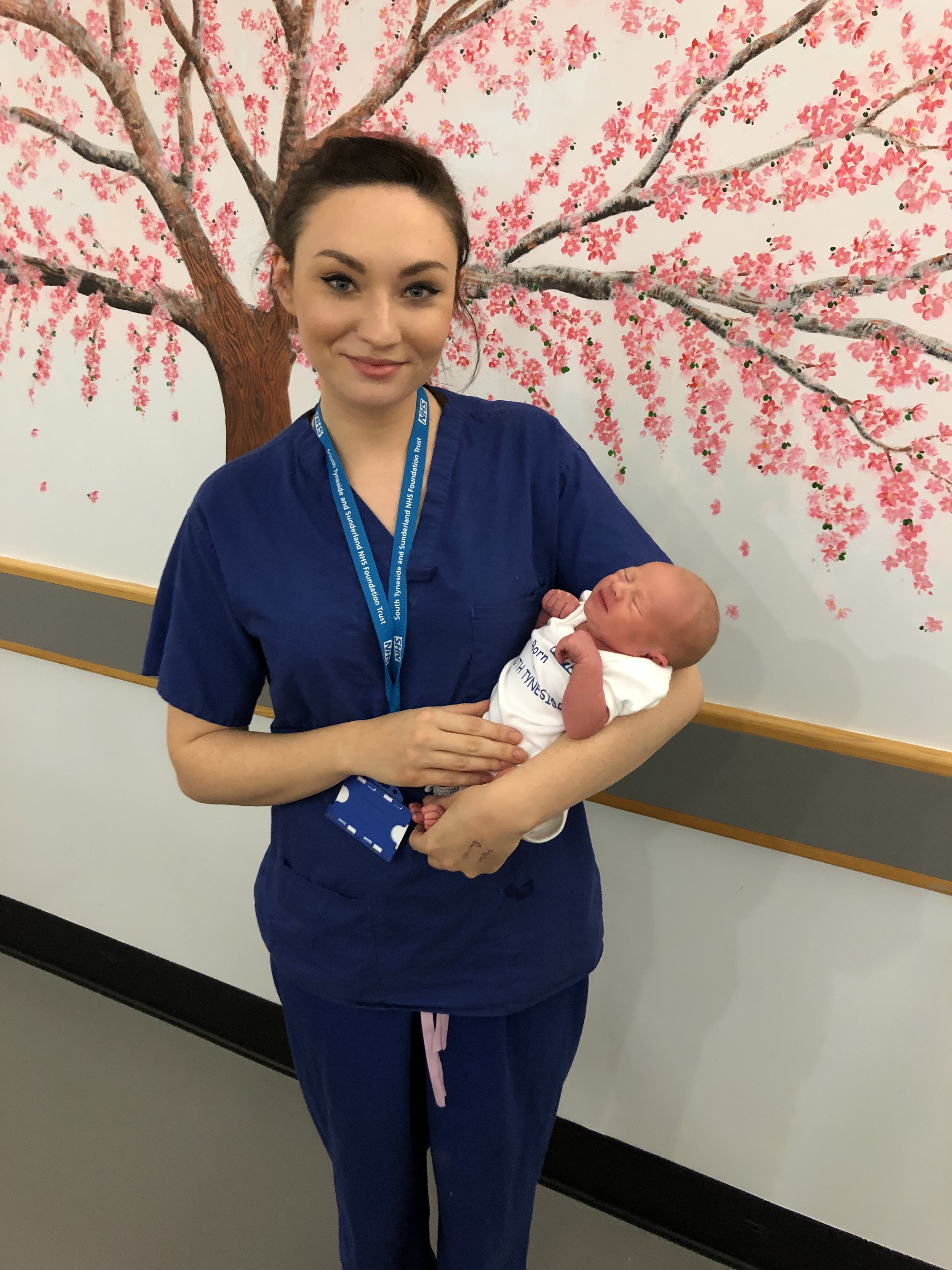 Midwife Joanna Wylie and baby Riley.jpg