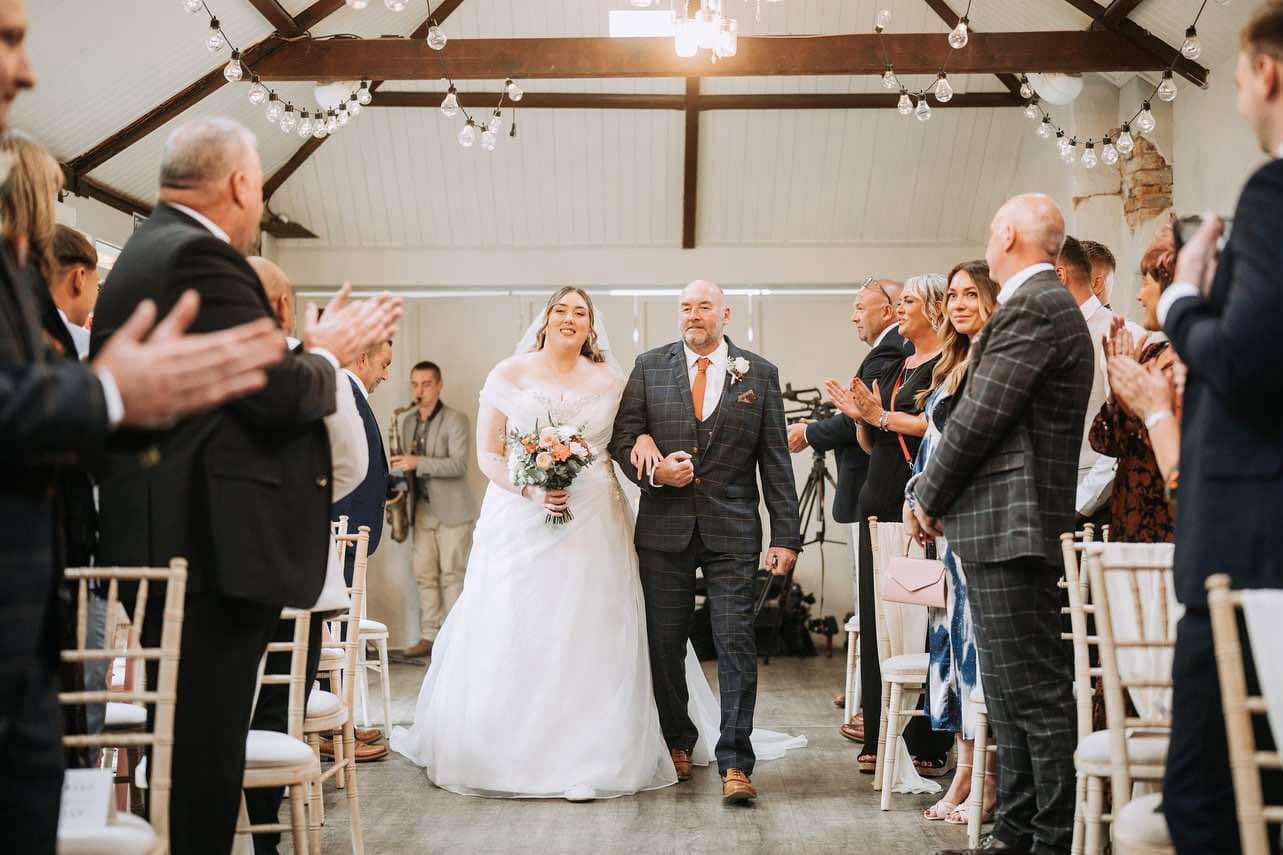 Martin Simpson walking daughter Emily down the aisle. Photo by Nikolaos Axelis of Hope Visual Productions..jpg
