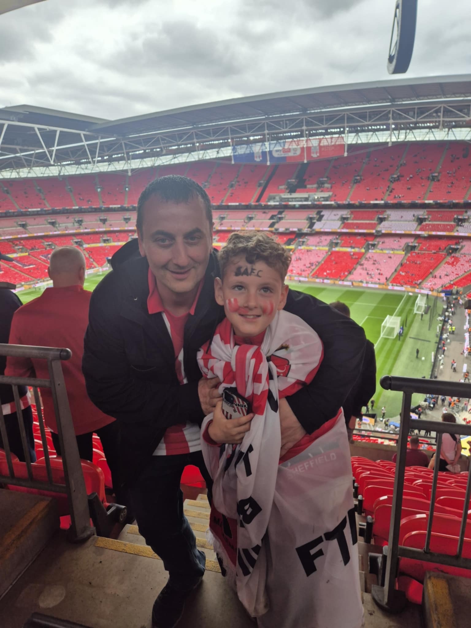 Brian Soulsby with his son Ben, 10, at Wembley Stadium..jpg