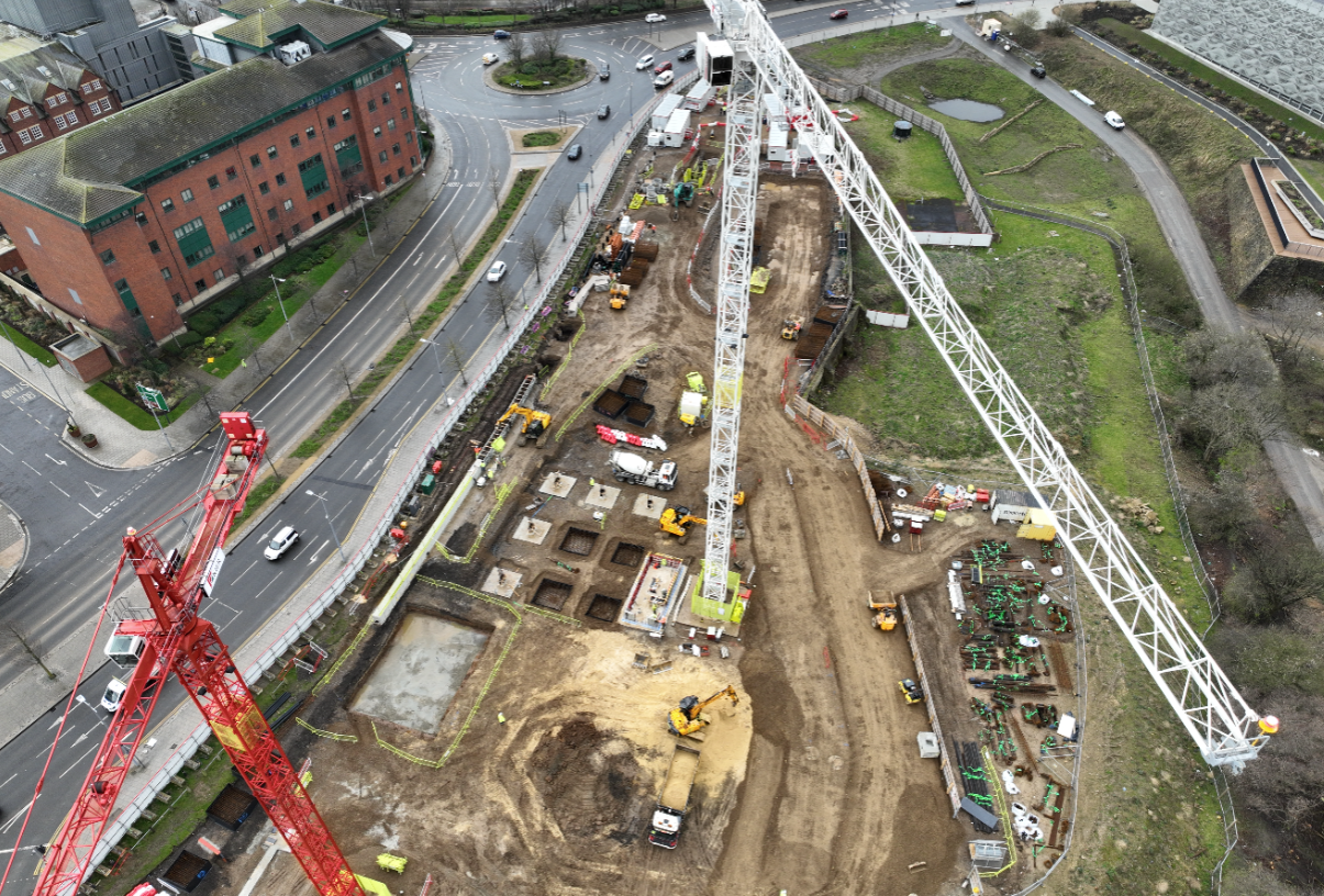 A photo taken using a drone shows the cranes on site and where construction work has begun on the new eye hospital..png