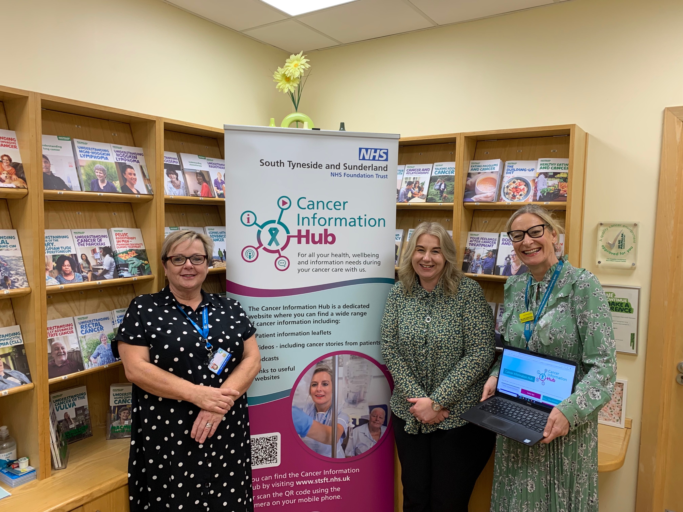 Debra Spraggon, Kelly Craggs and Melanie Robertson, who are members of the Trust's Macmillan team, with information about the Cancer Hub site..jpg
