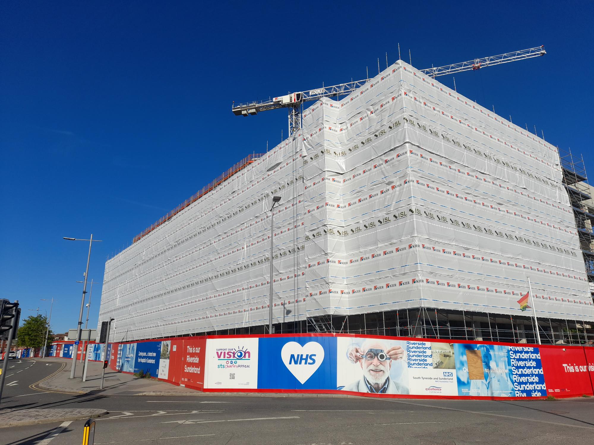 Protective sheeting has been put around the building as work continues on the new Eye Hospital..jpg