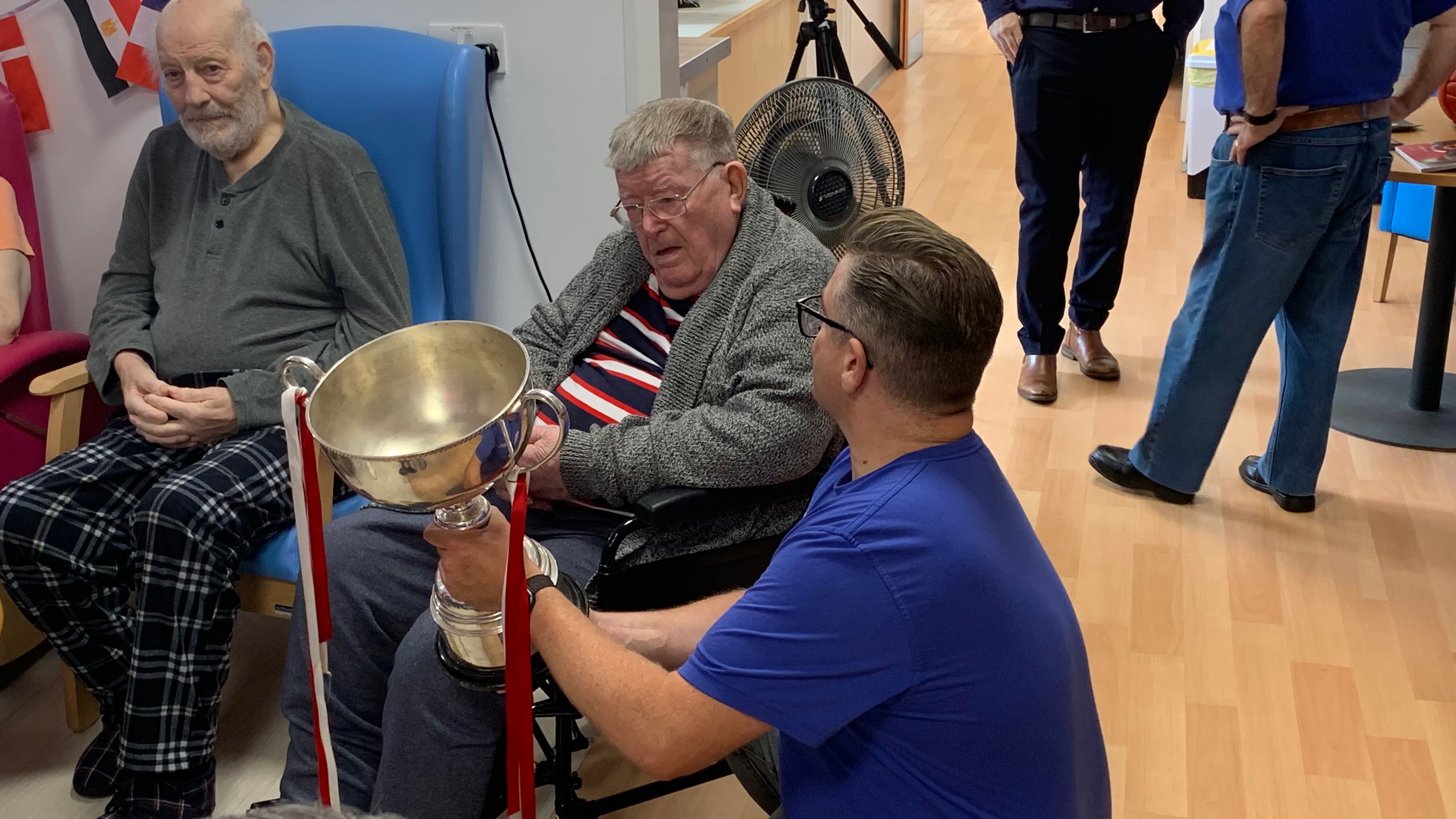 A Fans Museum shows Women's Premier League Trophy to one of the patients at Sunderland Royal Hospital..jpg