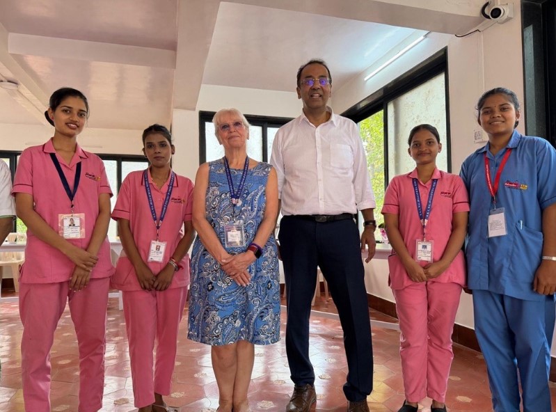Eleanor Freeman, pictured second from left, and Dr Sanjay Deshpande, with members of staff from the hospital they visited in Dervan. (1).jpg