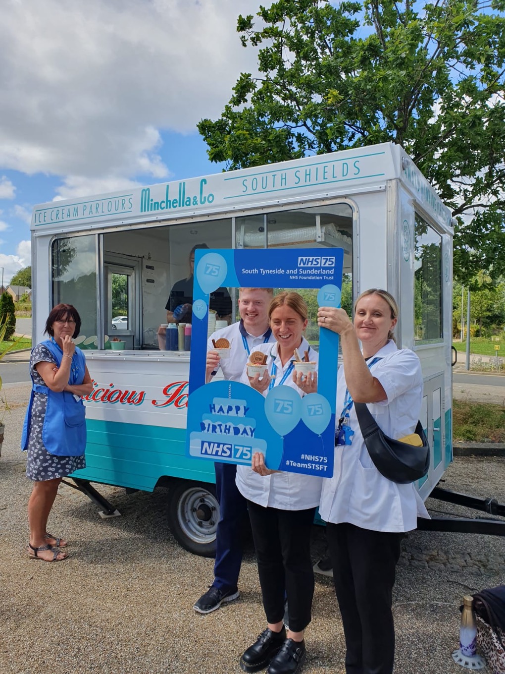 Trust staff at St Benedict's Hospice enjoy a Minchella and Co ice cream as part of the NHS 75 celebrations..jpg