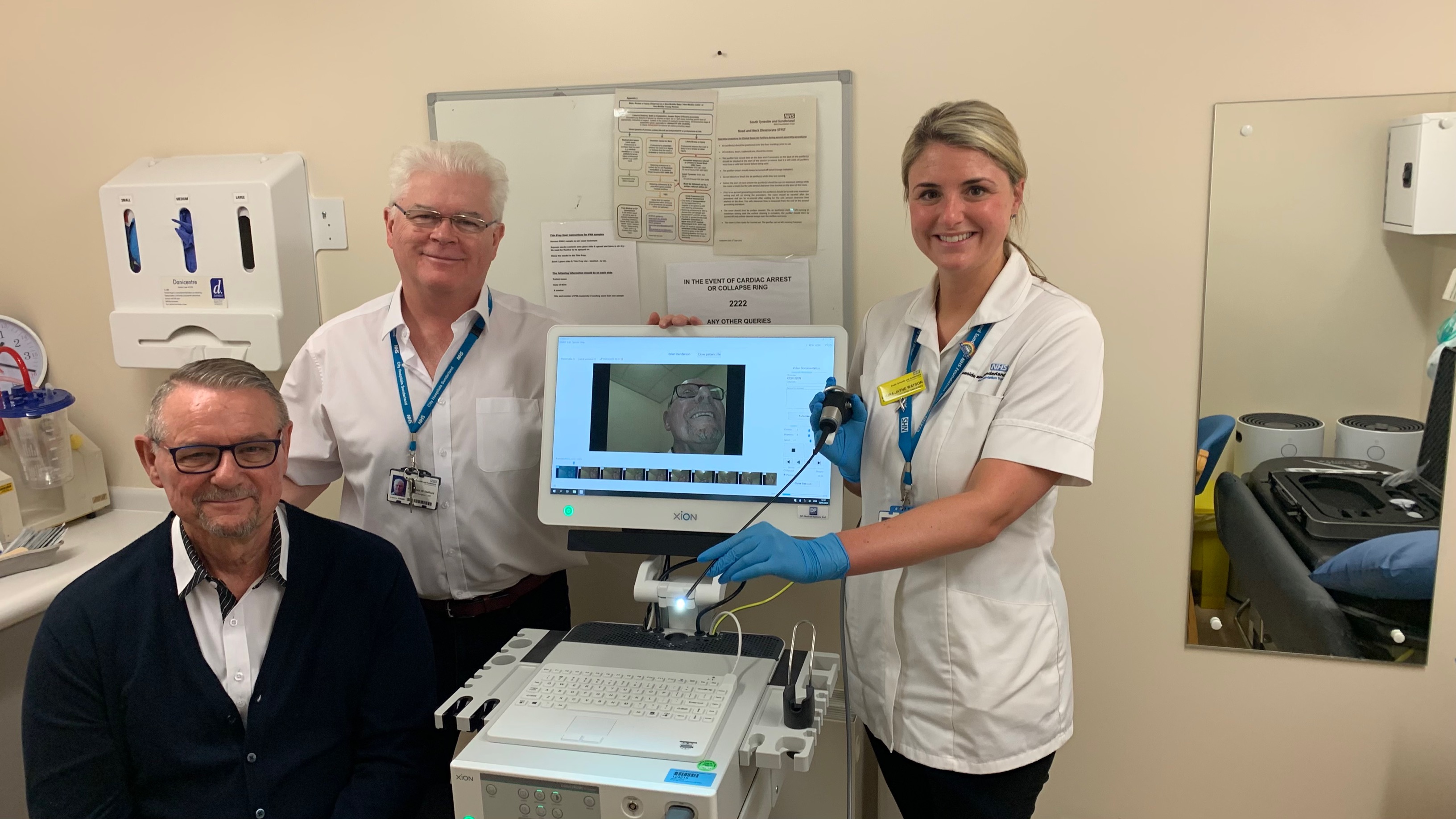 Brian Henderson with Consultant Frank Stafford and Laura-Jayne Watson, Clinical Lead for SALT, and the equipment Brian and wife Donna fundraised to buy..jpg