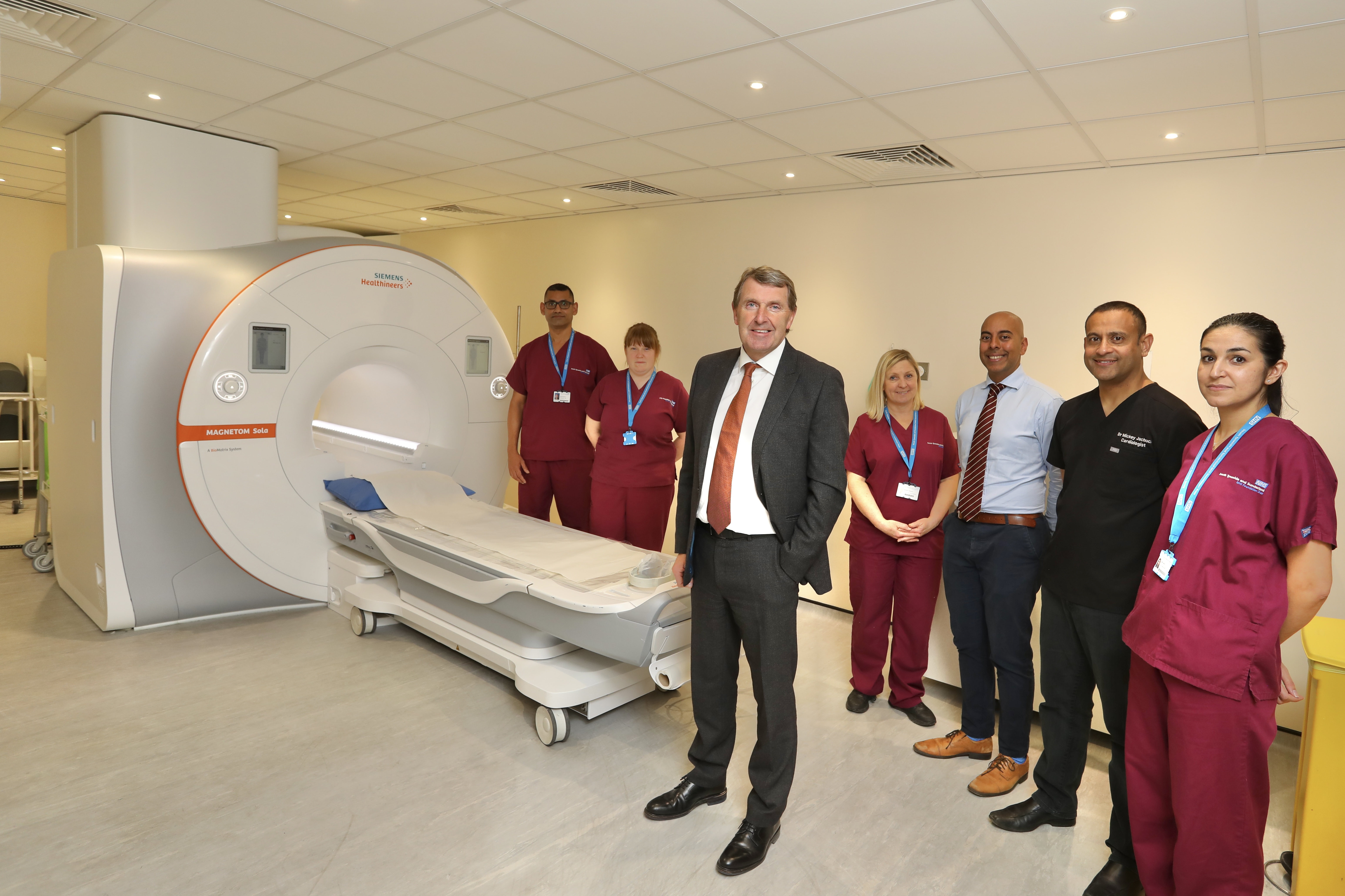Chief Executive of South Tyneside and Sunderland NHS Foundation Trust Ken Bremner MBE with members of the radiography and cardiology team leading the new service..jpg