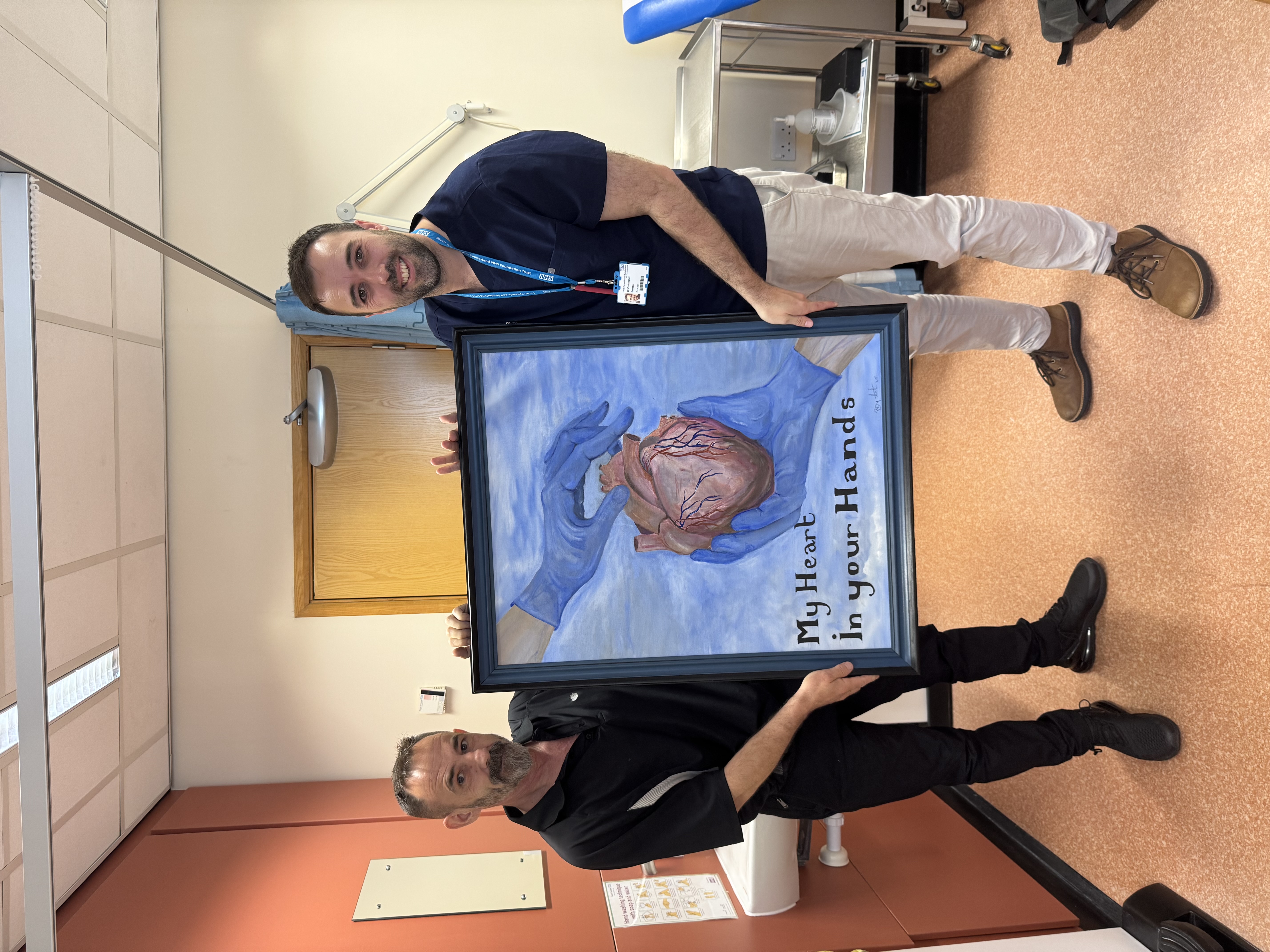 Jason Bryant as he presented the painting to Dr Chris Benson.jpg